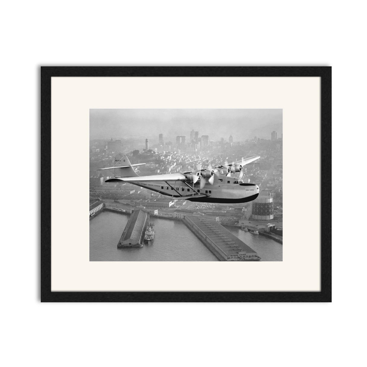 Aerial view of Pan American Airways "China Clipper" over San Francisco, 1936