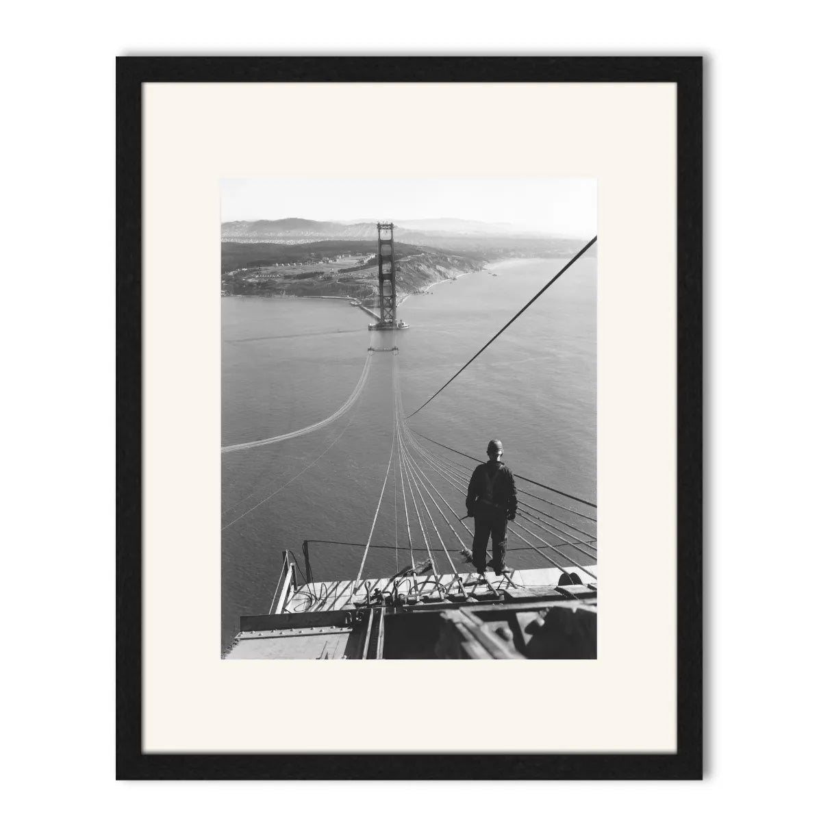 Man Standing on Cables of Golden Gate Bridge During Construction, 1935.