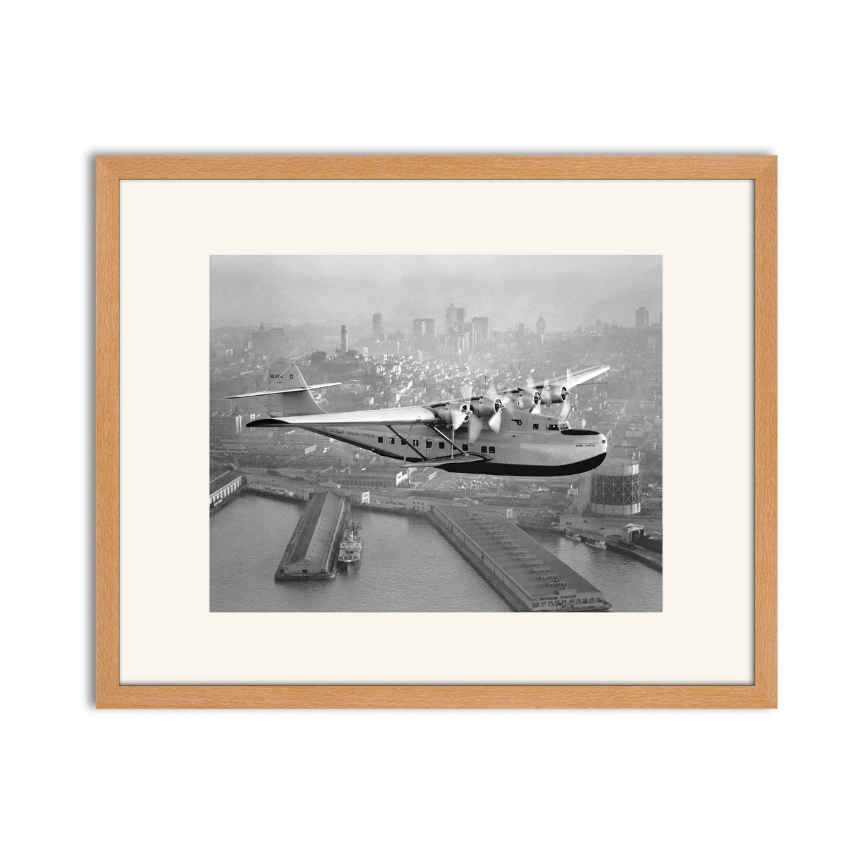 Aerial view of Pan American Airways "China Clipper" over San Francisco, 1936