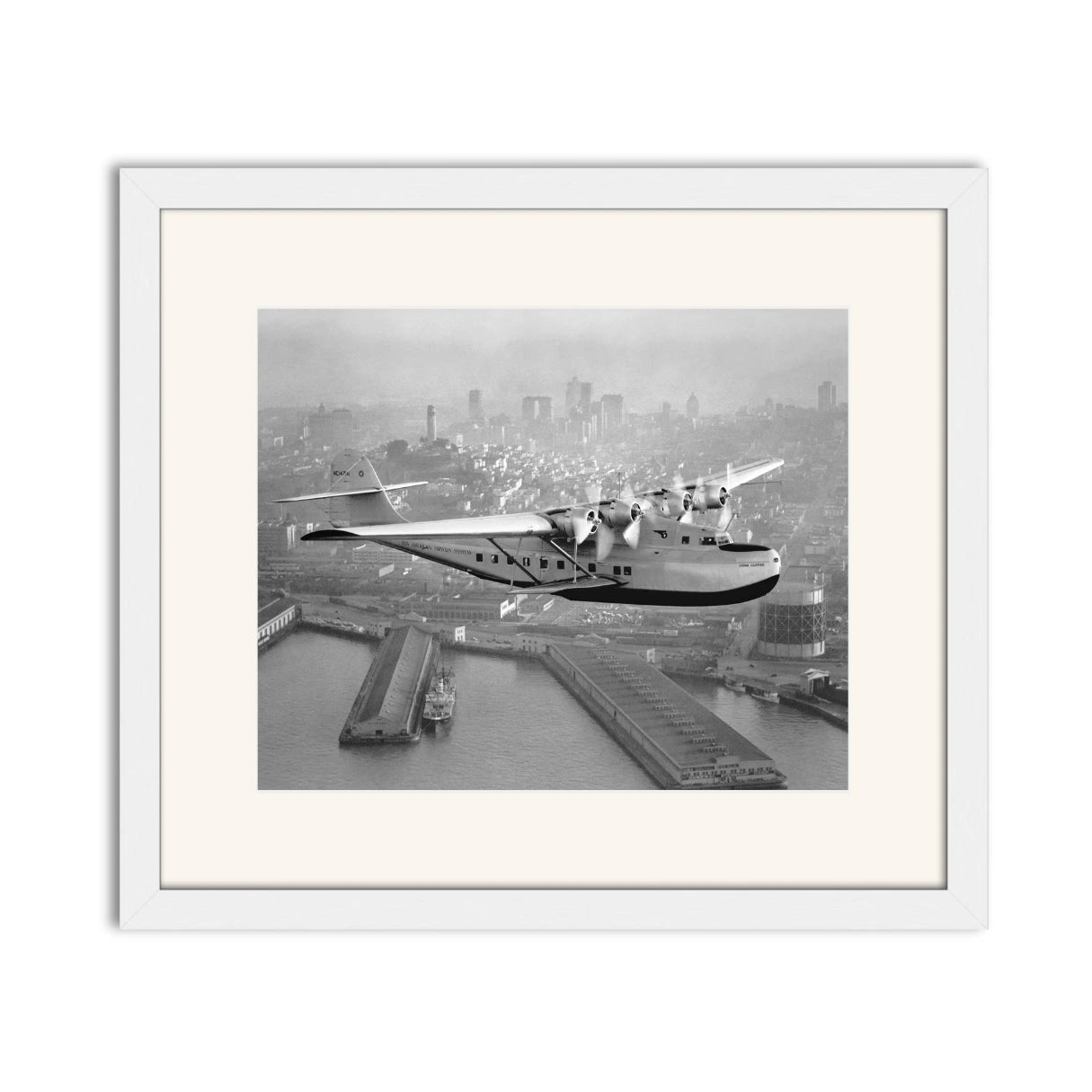 Aerial view of Pan American Airways "China Clipper" over San Francisco, 1936