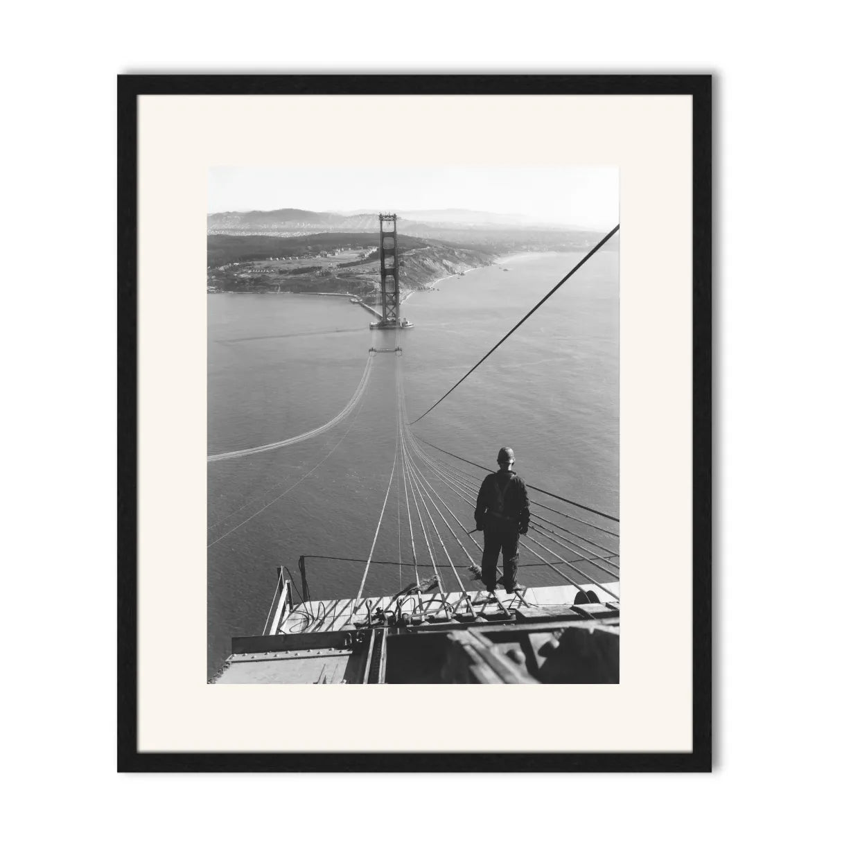 Man Standing on Cables of Golden Gate Bridge During Construction, 1935.