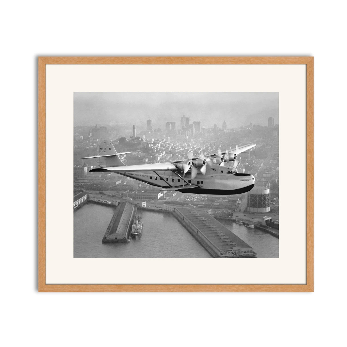 Aerial view of Pan American Airways "China Clipper" over San Francisco, 1936