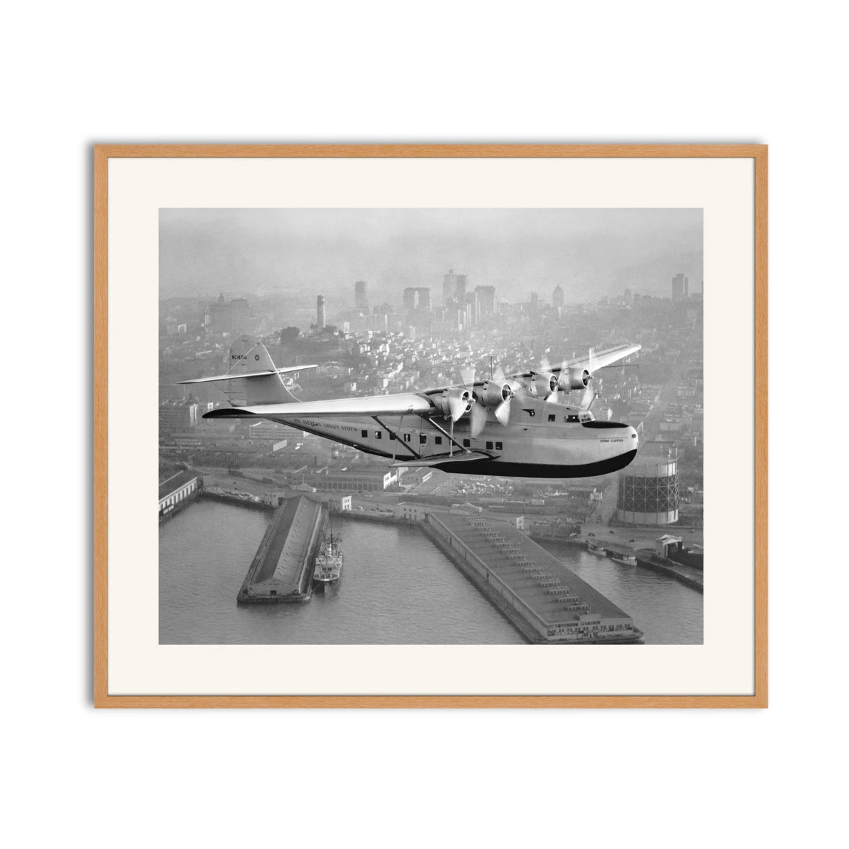 Aerial view of Pan American Airways "China Clipper" over San Francisco, 1936