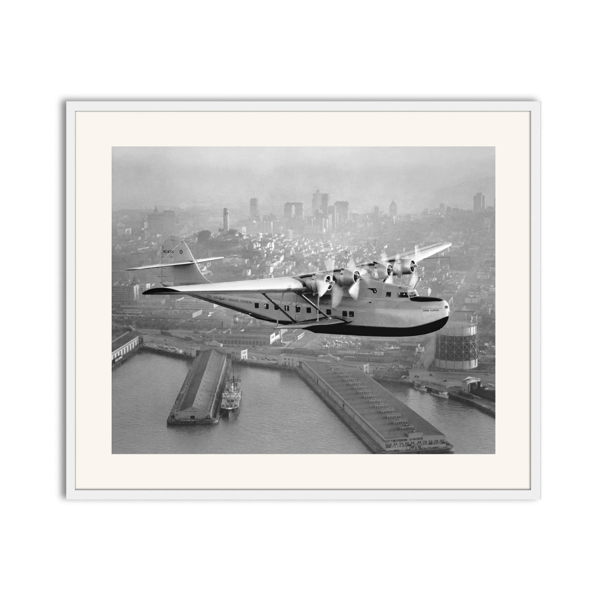 Aerial view of Pan American Airways "China Clipper" over San Francisco, 1936