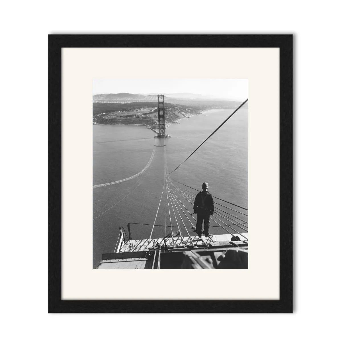 Man Standing on Cables of Golden Gate Bridge During Construction, 1935.