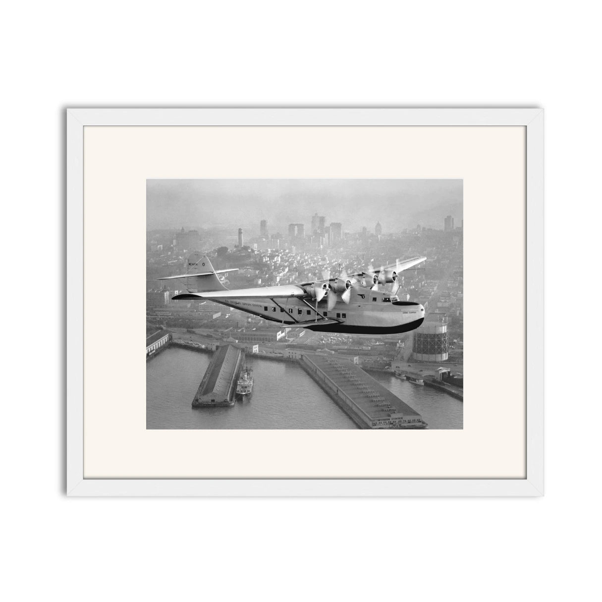 Aerial view of Pan American Airways "China Clipper" over San Francisco, 1936