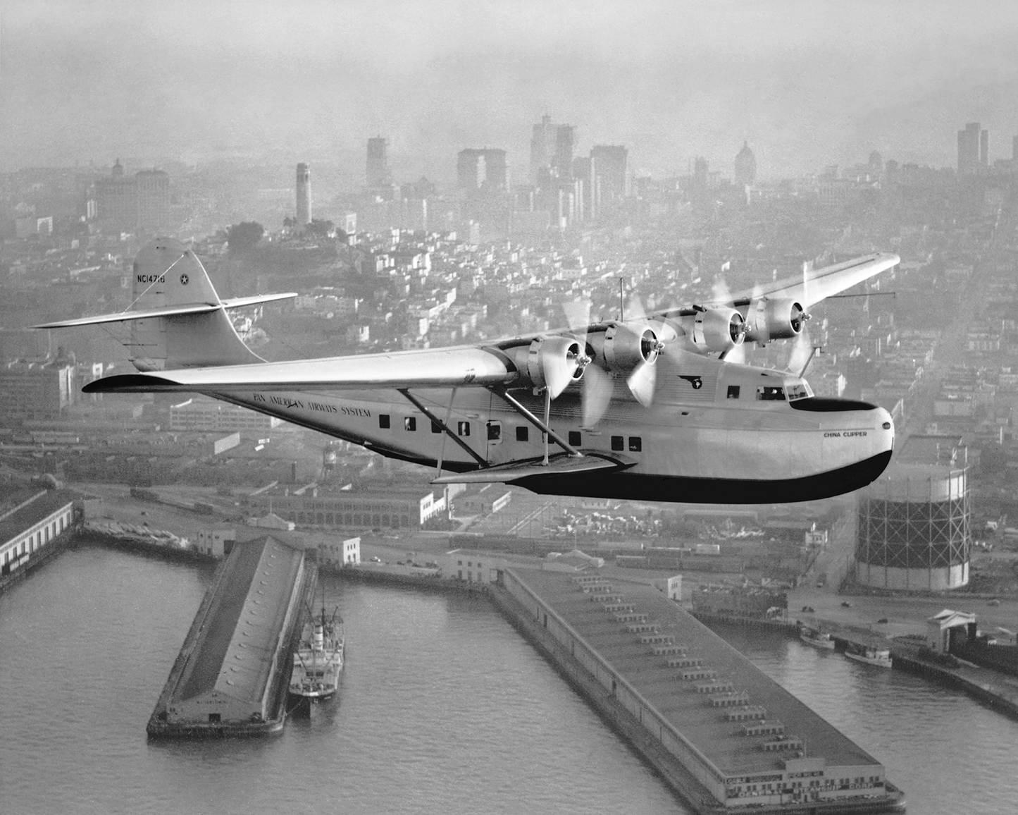 Aerial view of Pan American Airways "China Clipper" over San Francisco, 1936