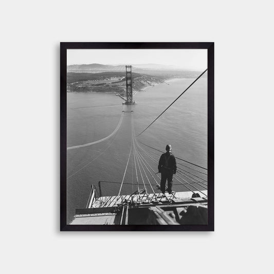 Man Standing on Cables of Golden Gate Bridge During Construction, 1935.