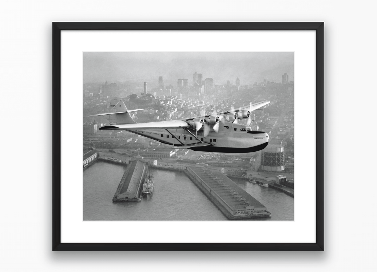 Aerial view of Pan American Airways "China Clipper" over San Francisco, 1936