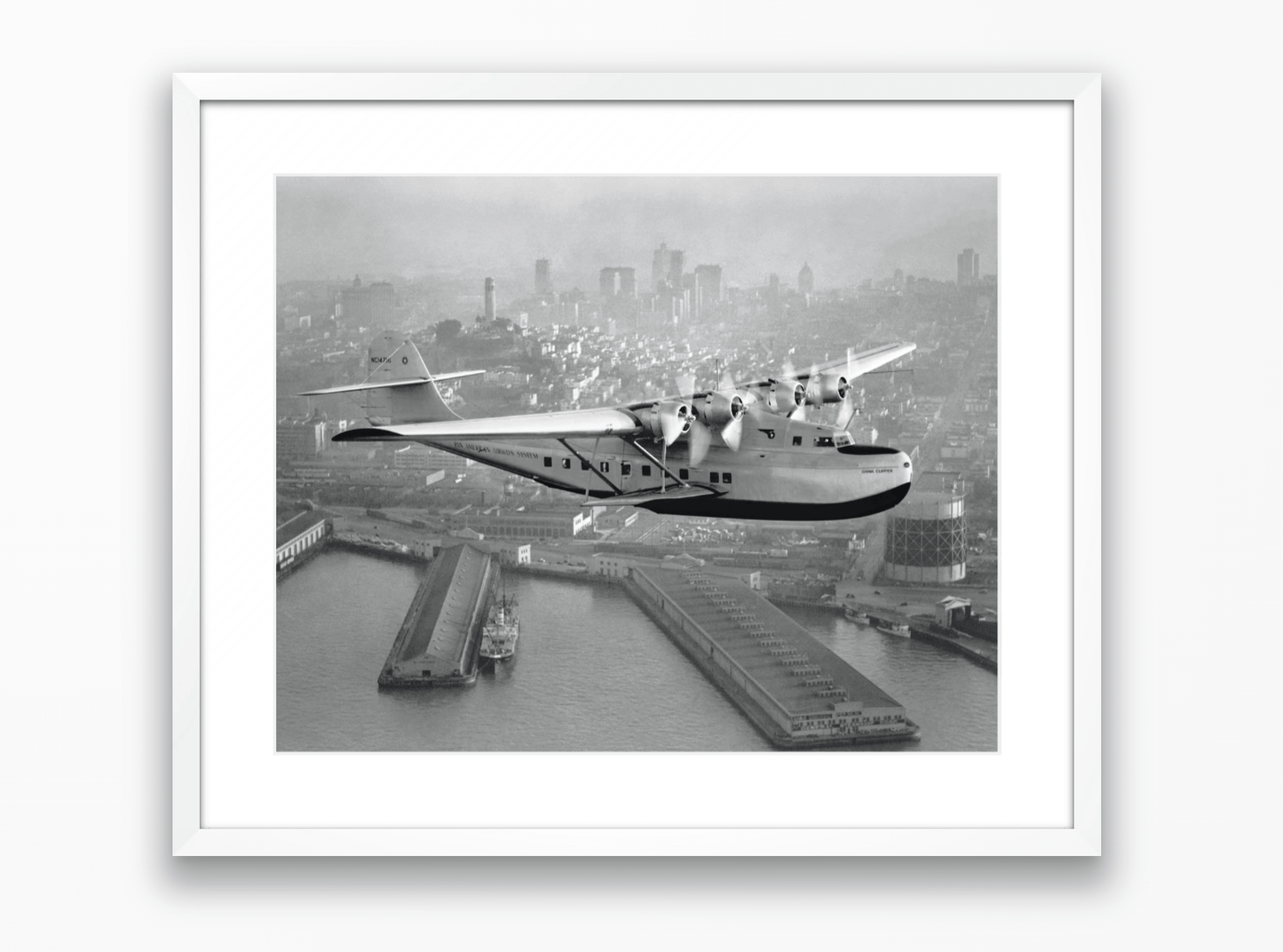 Aerial view of Pan American Airways "China Clipper" over San Francisco, 1936