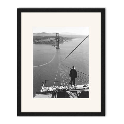 Man Standing on Cables of Golden Gate Bridge During Construction, 1935.