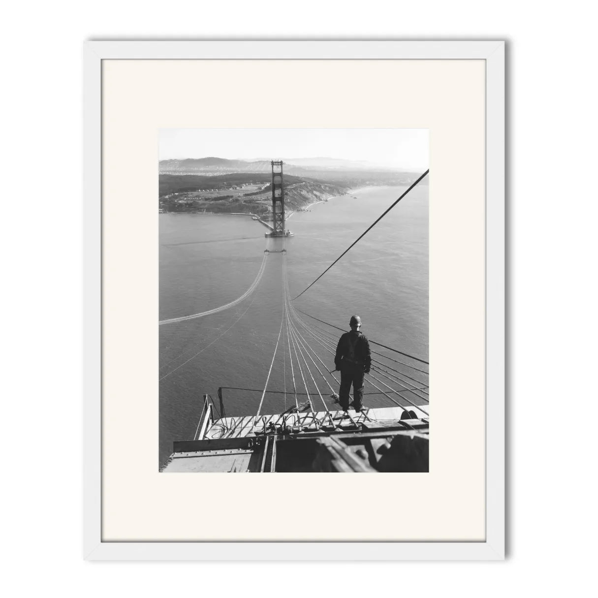 Man Standing on Cables of Golden Gate Bridge During Construction, 1935.