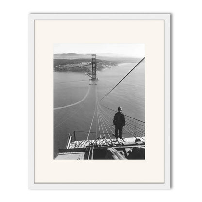 Man Standing on Cables of Golden Gate Bridge During Construction, 1935.