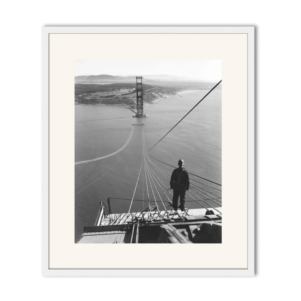 Man Standing on Cables of Golden Gate Bridge During Construction, 1935.