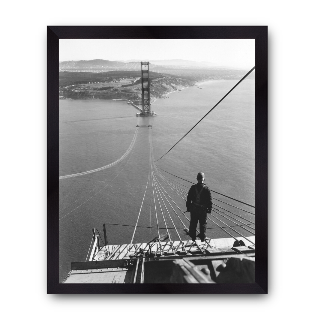 Man Standing on Cables of Golden Gate Bridge During Construction, 1935.
