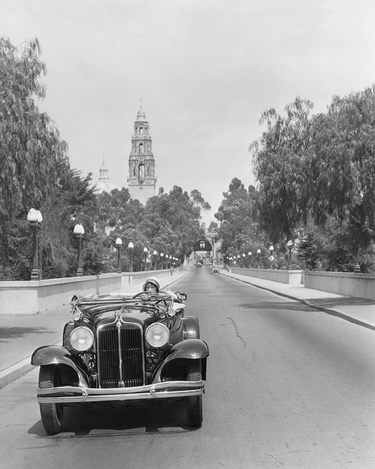 Young woman Driving on Cabrillo Bridge, 1931.
