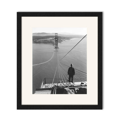 Man Standing on Cables of Golden Gate Bridge During Construction, 1935.