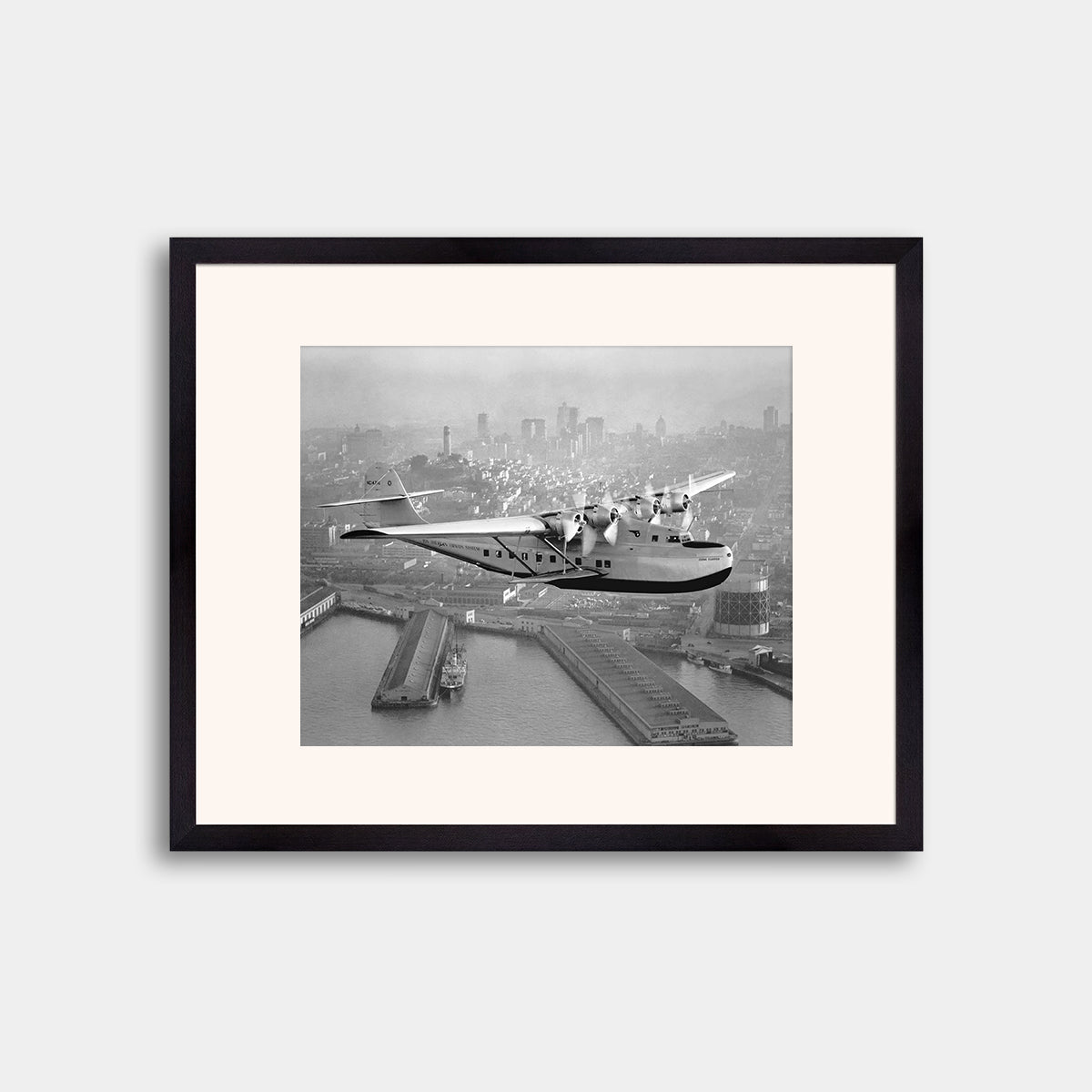 Aerial view of Pan American Airways "China Clipper" over San Francisco, 1936