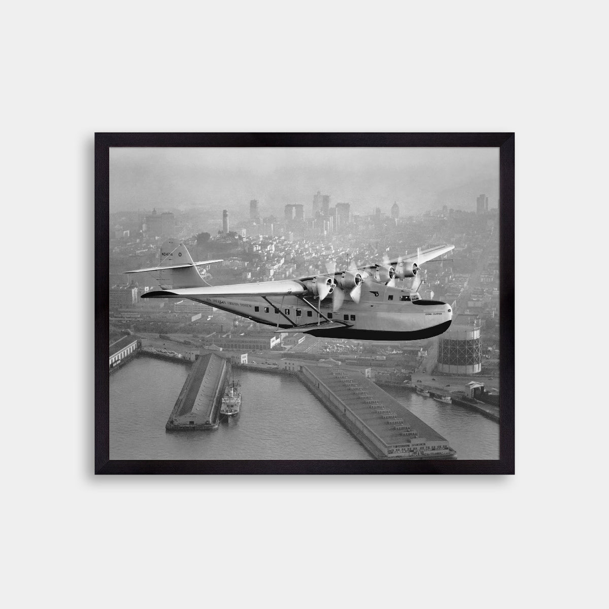 Aerial view of Pan American Airways "China Clipper" over San Francisco, 1936