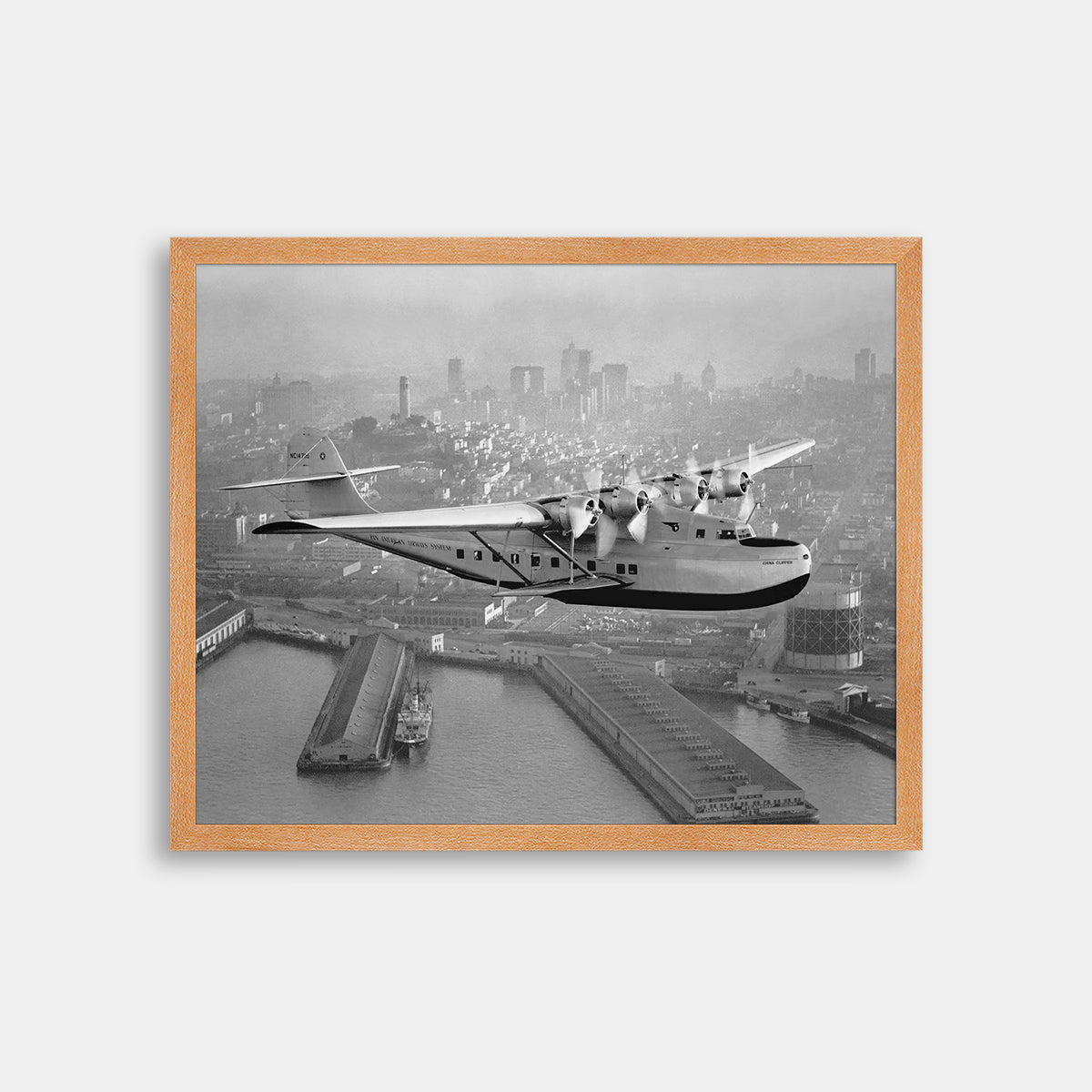 Aerial view of Pan American Airways "China Clipper" over San Francisco, 1936