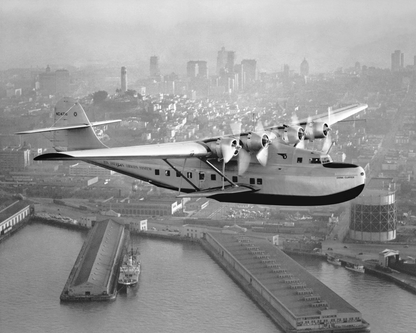 Aerial view of Pan American Airways "China Clipper" over San Francisco, 1936