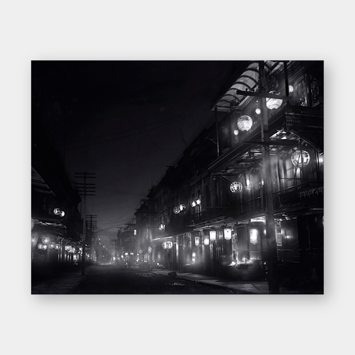 Chinatown street at night lit with lanterns, 1903