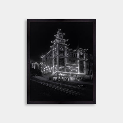 Chinatown building at California Street and Grant Avenue lit up at night, 1908