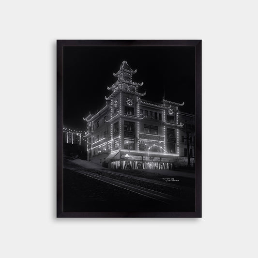 Chinatown building at California Street and Grant Avenue lit up at night, 1908
