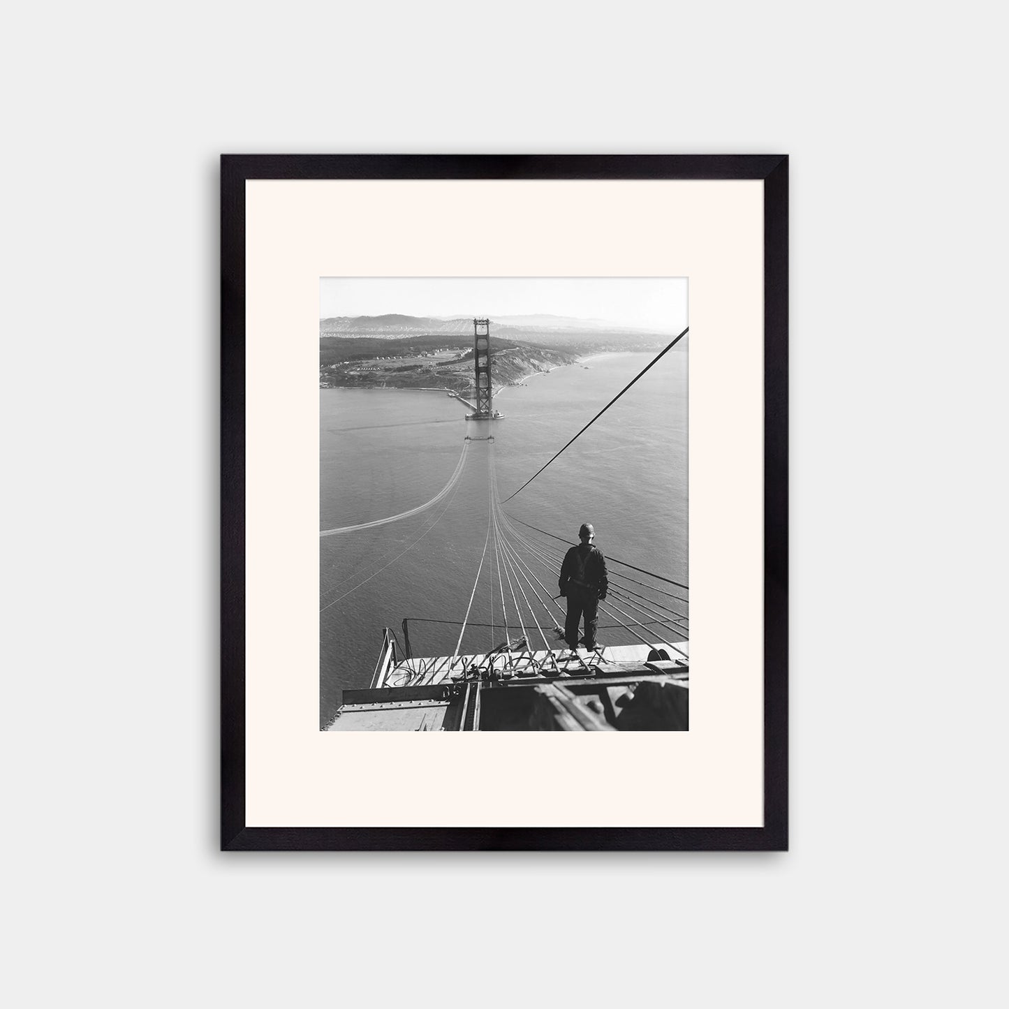 Man Standing on Cables of Golden Gate Bridge During Construction, 1935.