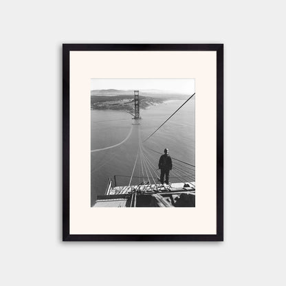 Man Standing on Cables of Golden Gate Bridge During Construction, 1935.