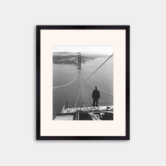 Man Standing on Cables of Golden Gate Bridge During Construction, 1935.