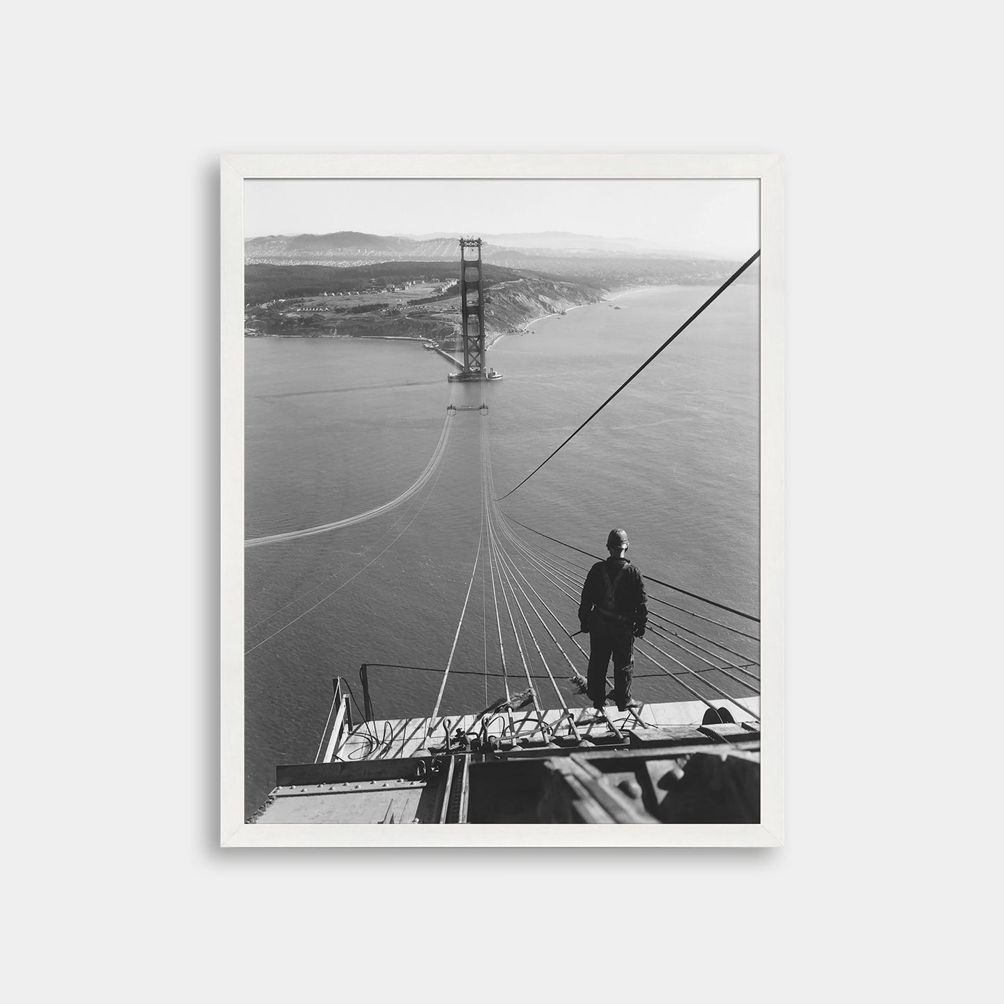 Man Standing on Cables of Golden Gate Bridge During Construction, 1935.