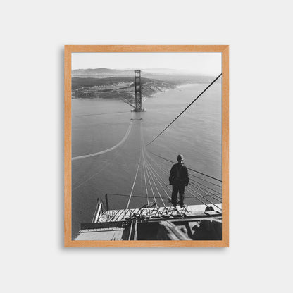 Man Standing on Cables of Golden Gate Bridge During Construction, 1935.