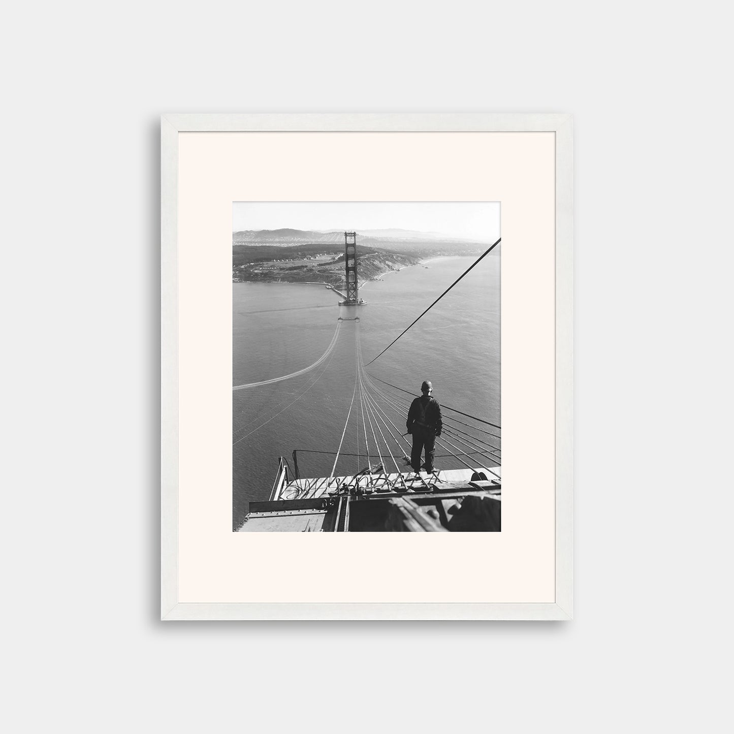 Man Standing on Cables of Golden Gate Bridge During Construction, 1935.