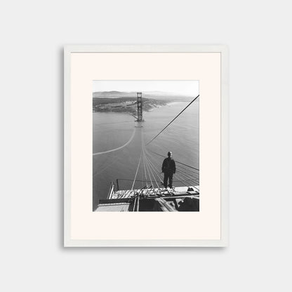 Man Standing on Cables of Golden Gate Bridge During Construction, 1935.