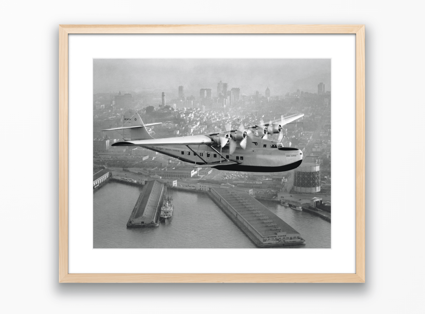 Aerial view of Pan American Airways "China Clipper" over San Francisco, 1936