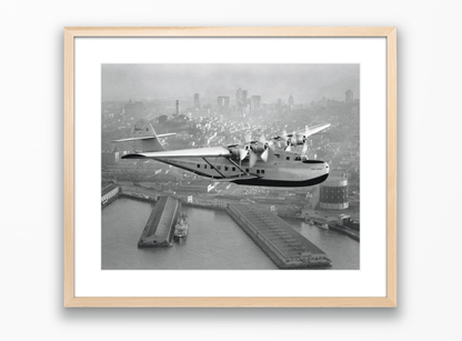 Aerial view of Pan American Airways "China Clipper" over San Francisco, 1936