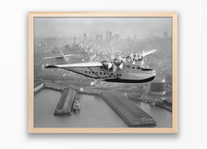 Aerial view of Pan American Airways "China Clipper" over San Francisco, 1936