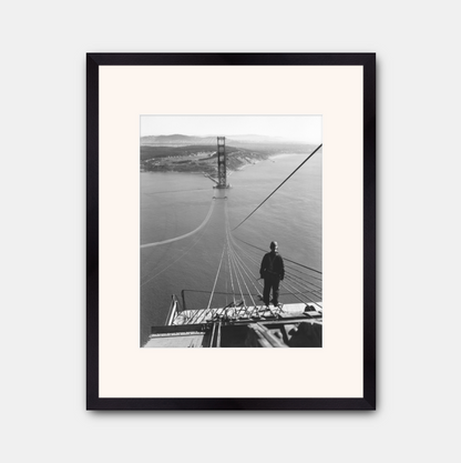 Man Standing on Cables of Golden Gate Bridge During Construction, 1935.