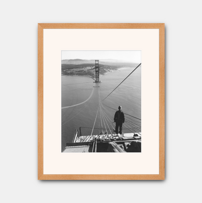 Man Standing on Cables of Golden Gate Bridge During Construction, 1935.