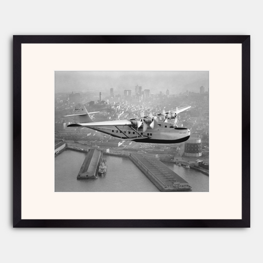 Aerial view of Pan American Airways "China Clipper" over San Francisco, 1936