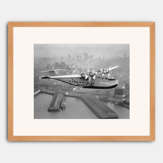 Aerial view of Pan American Airways "China Clipper" over San Francisco, 1936