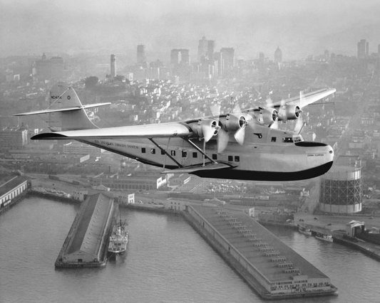 Aerial view of Pan American Airways "China Clipper" over San Francisco, 1936